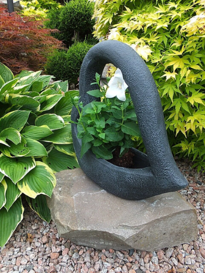 Black heart pot statue
