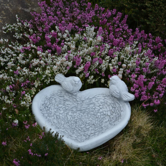 Concrete drinker for birds statue