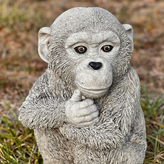 Concrete monkey figurine