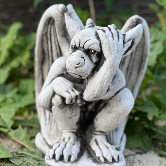 Sitting gargoyle statue