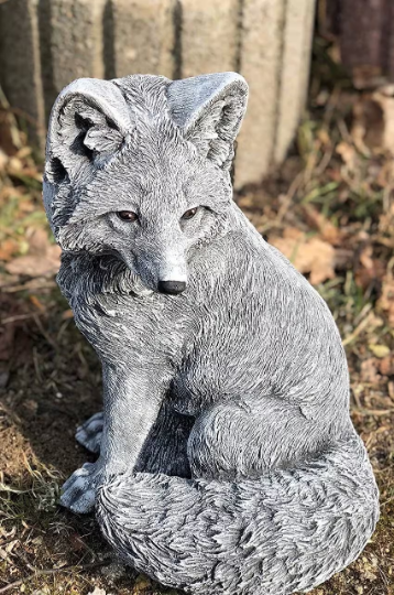 Concrete sitting fox figurine