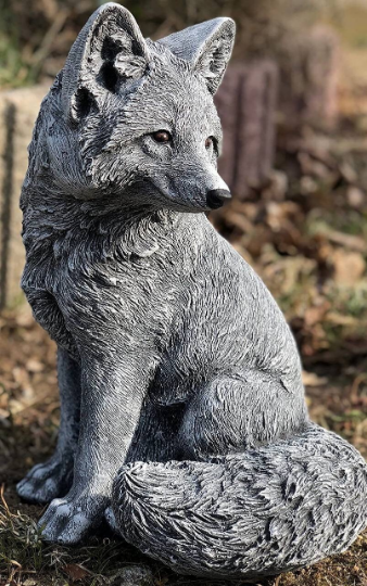 Concrete sitting fox figurine