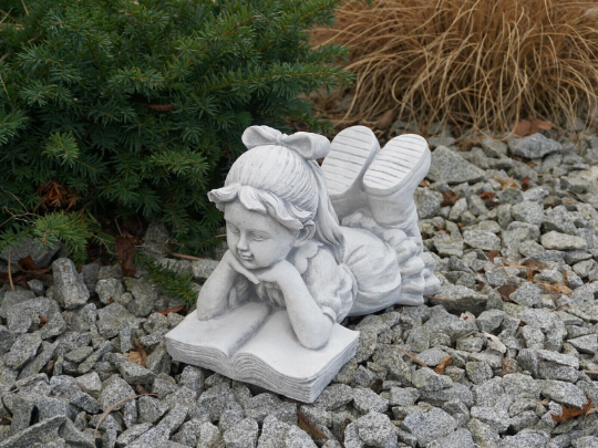 Large reading girl statue