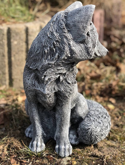 Concrete sitting fox figurine