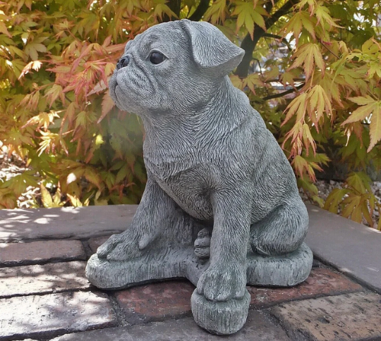 Pug dog sitting statue