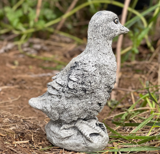 Duck standing statue