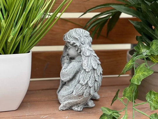 Praying angel figurine