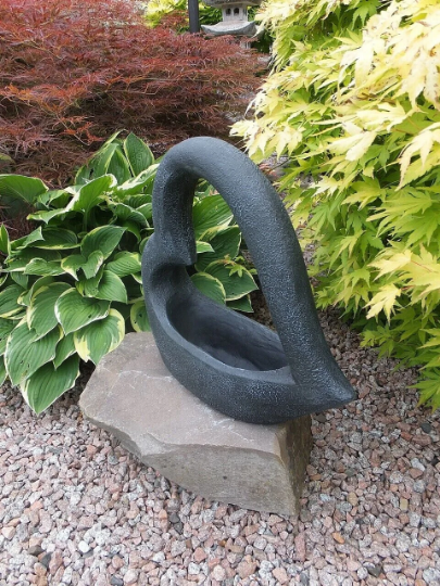 Black heart pot statue