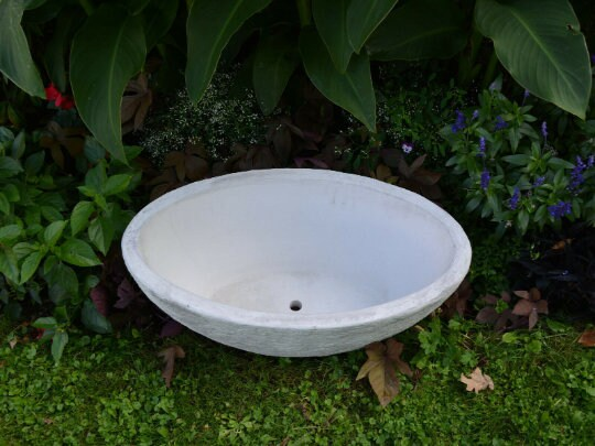 Concrete flower pot statue
