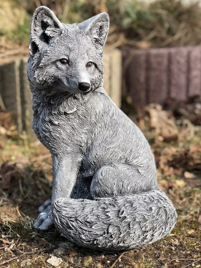 Concrete sitting fox figurine
