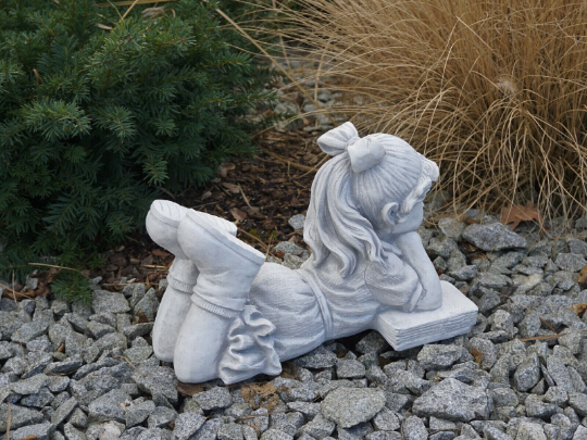 Large reading girl statue