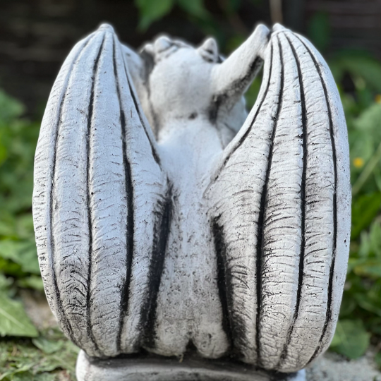 Sitting gargoyle statue