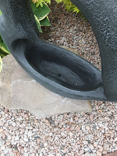 Black heart pot statue