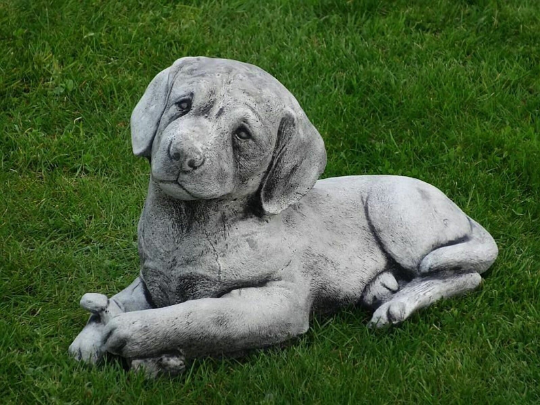 Labrador dog laying statue
