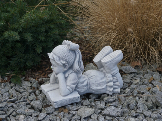 Large reading girl statue