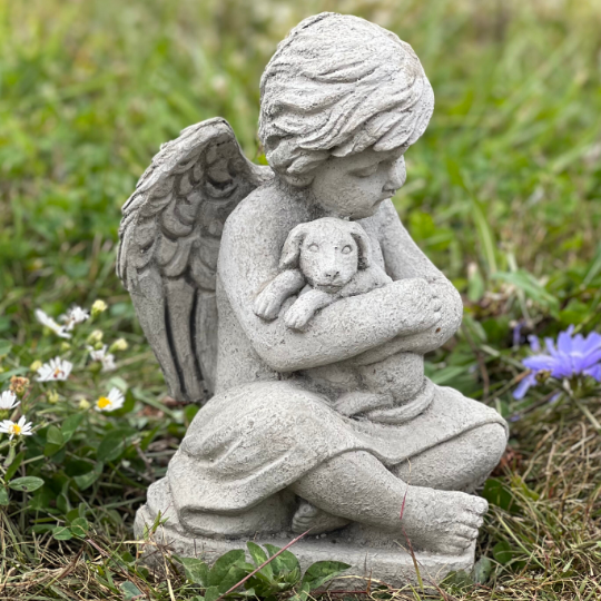 Angel with puppy statue