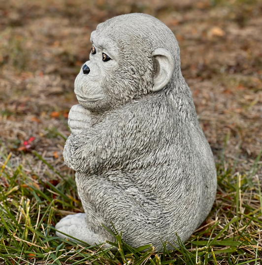 Concrete monkey figurine
