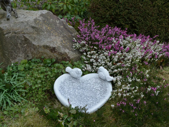 Concrete drinker for birds statue