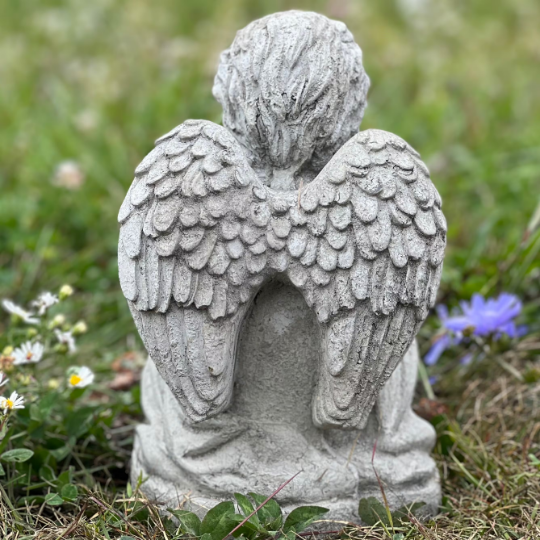 Angel with puppy statue