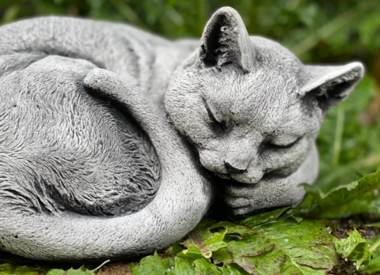 Concrete sleeping cat figurine