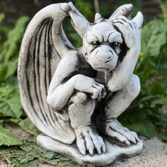 Sitting gargoyle statue