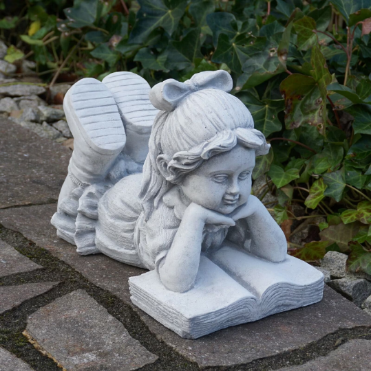 Large reading girl statue
