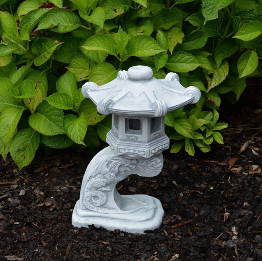 Concrete pagoda figurine