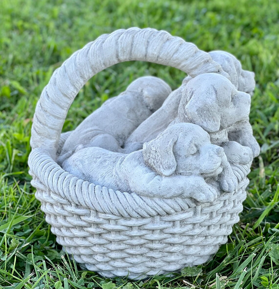 Basket with puppies figurine