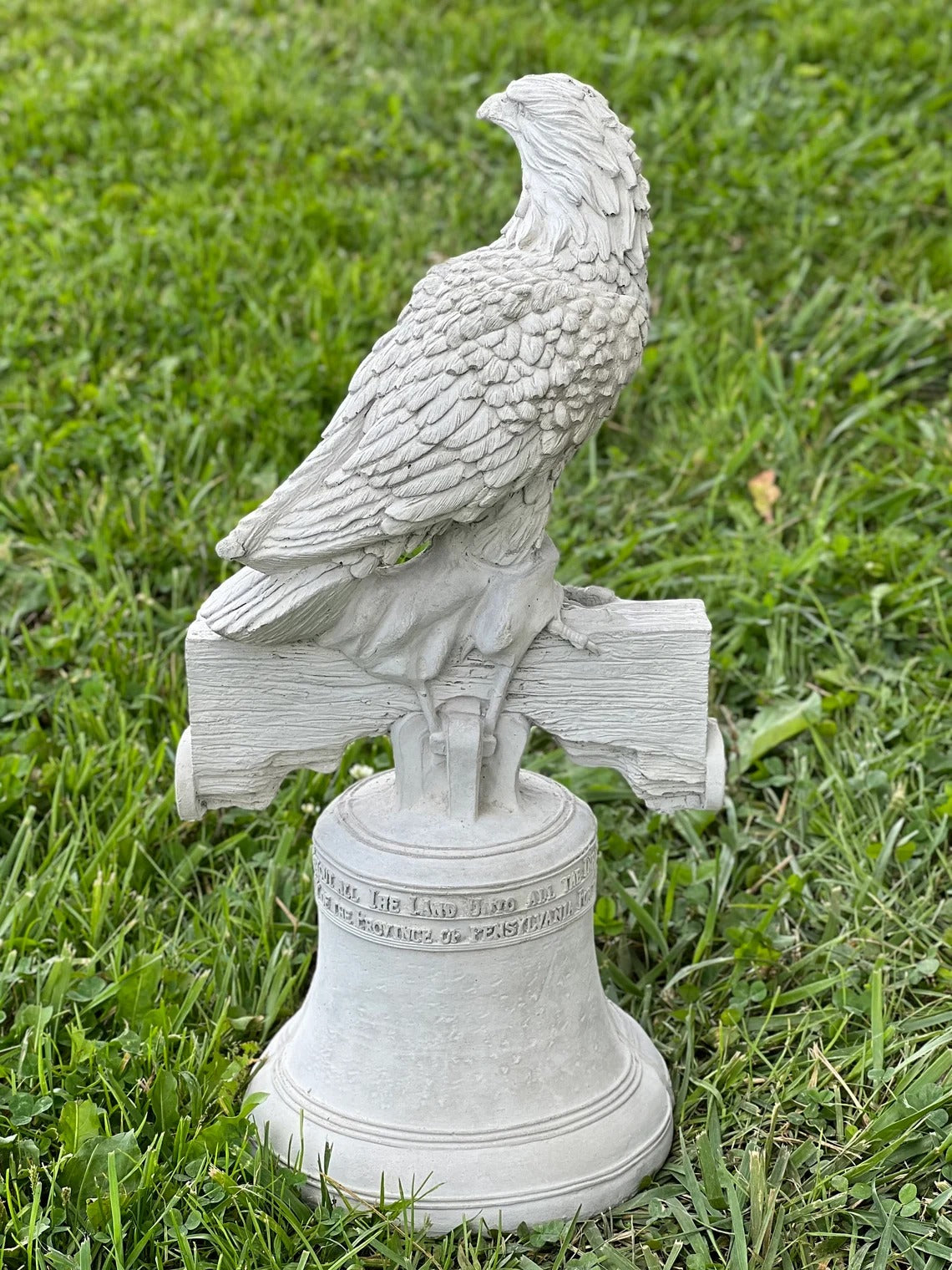 Eagle sitting on the bell statue