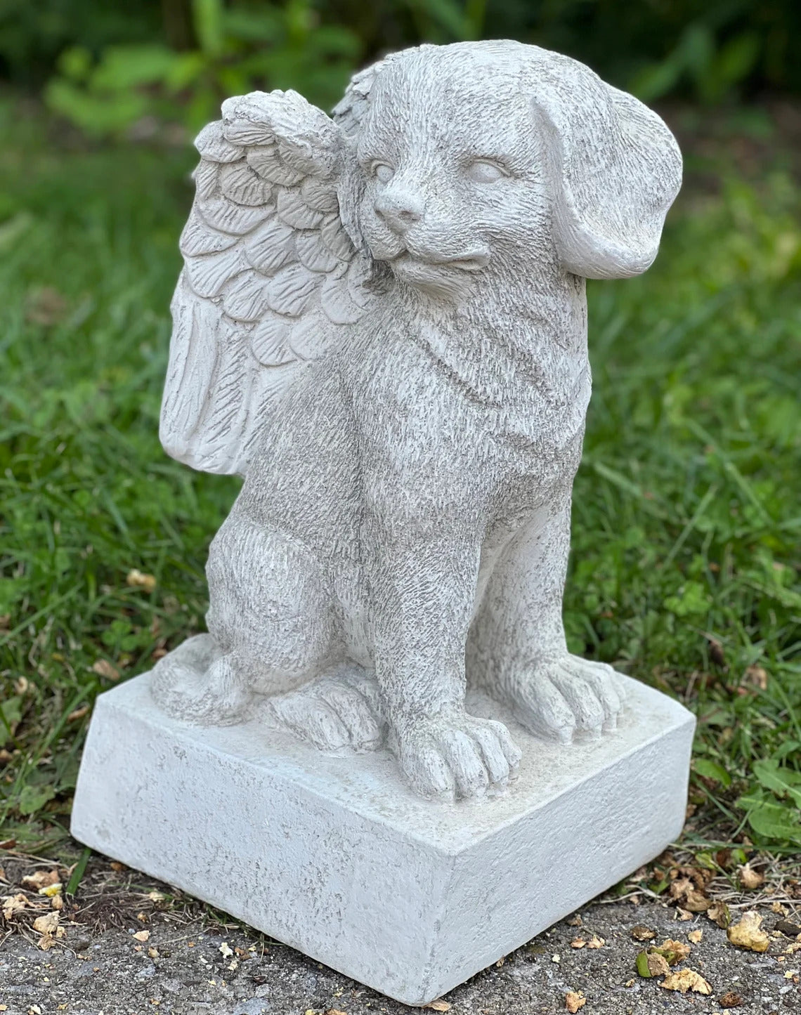 Sitting dog memorial with wings