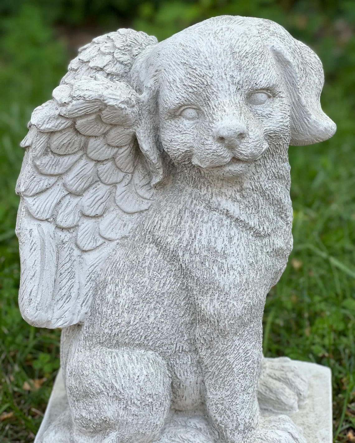 Sitting dog memorial with wings