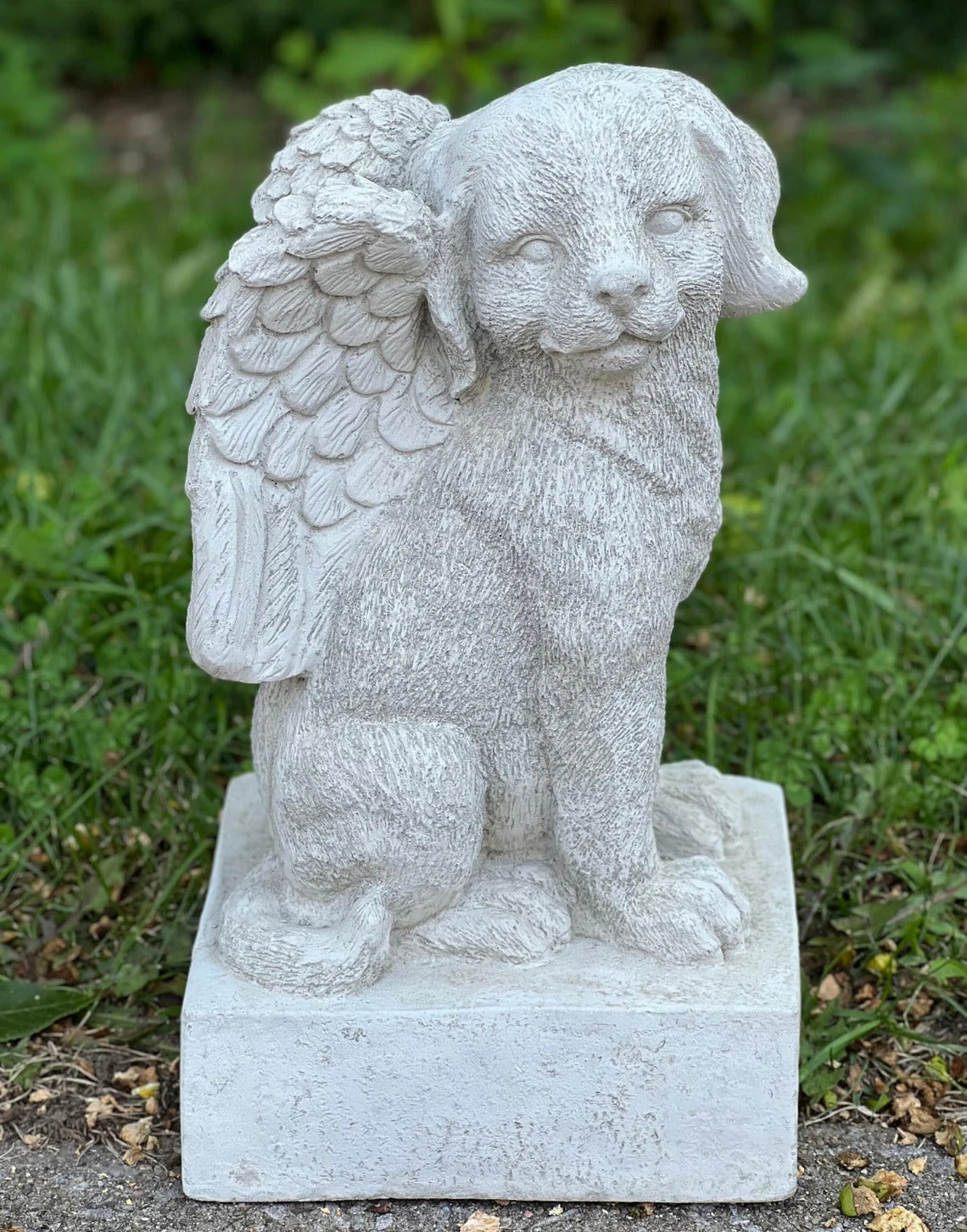 Sitting dog memorial with wings