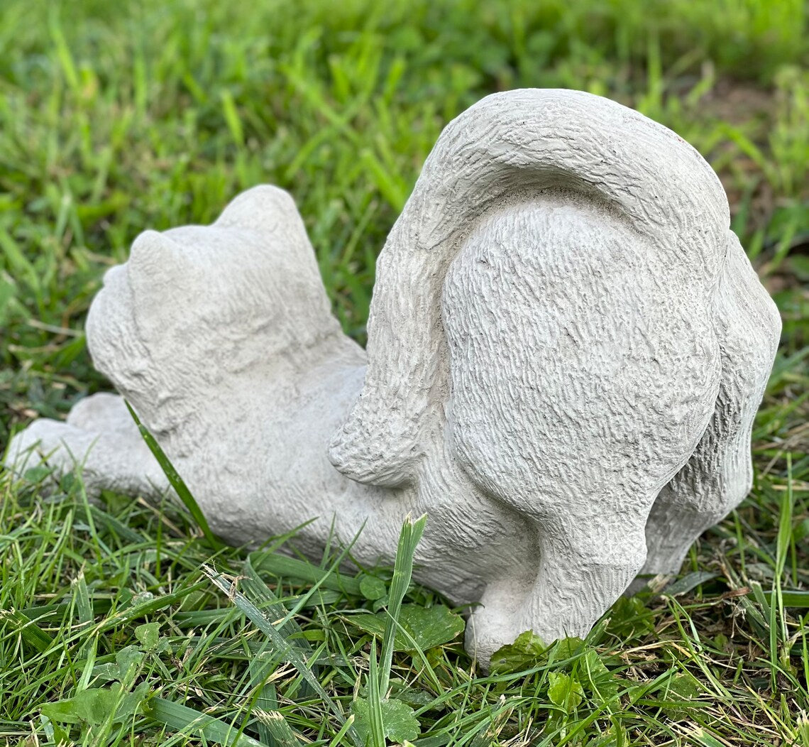 Stretching cat statue