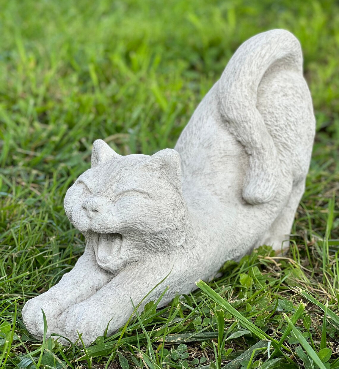 Stretching cat statue