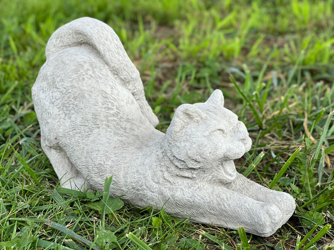 Stretching cat statue