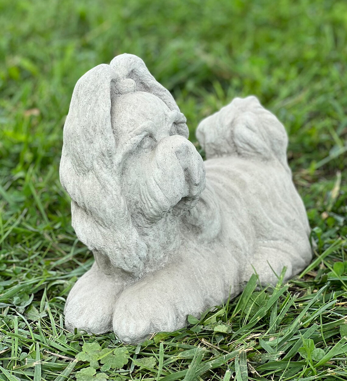 Laying Shih Tzu dog statue