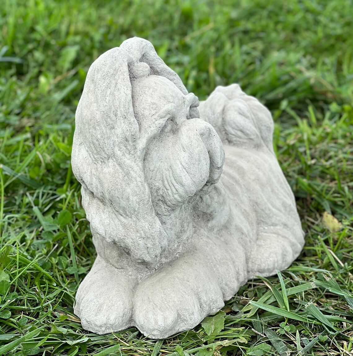 Laying Shih Tzu dog statue