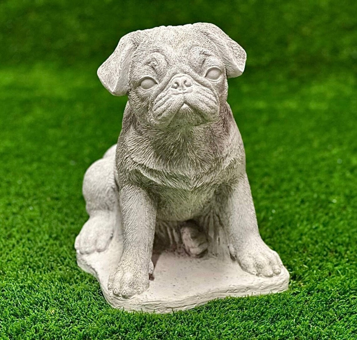 Sitting puppy pug concrete memorial