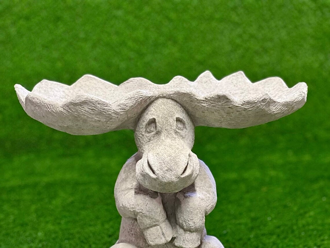 Sitting elk statue
