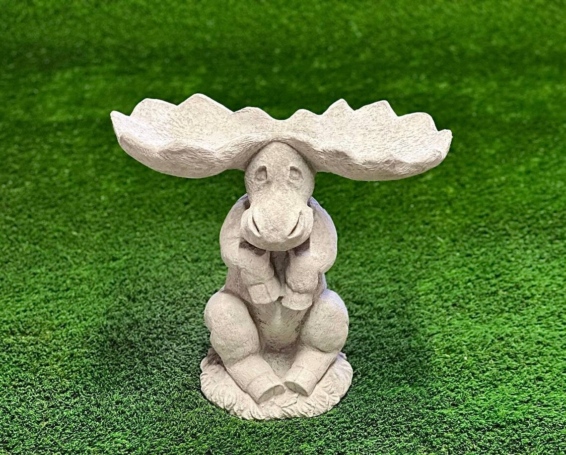 Sitting elk statue