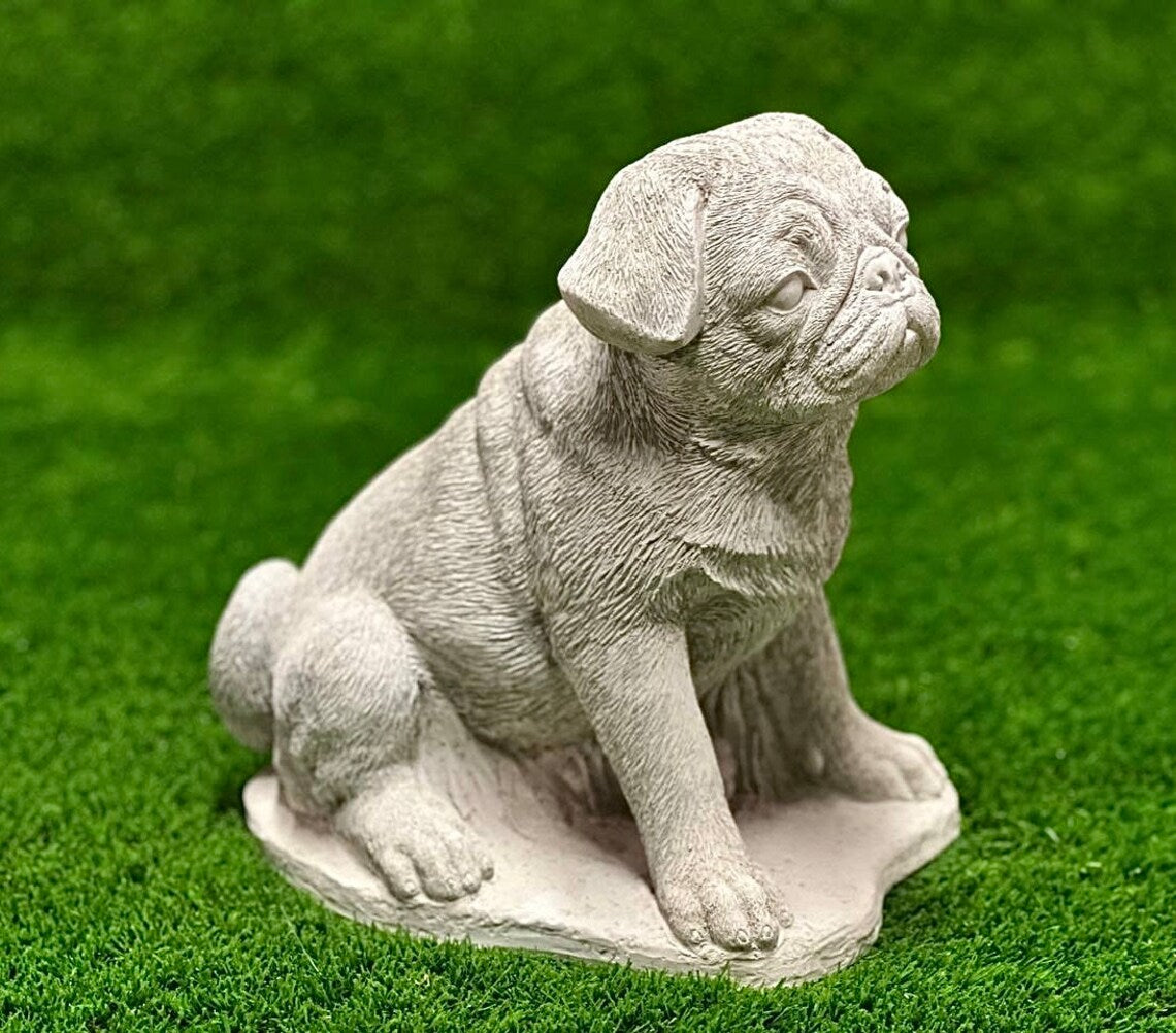 Sitting puppy pug concrete memorial