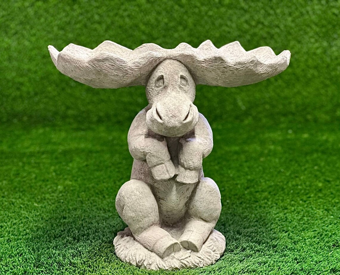 Sitting elk statue