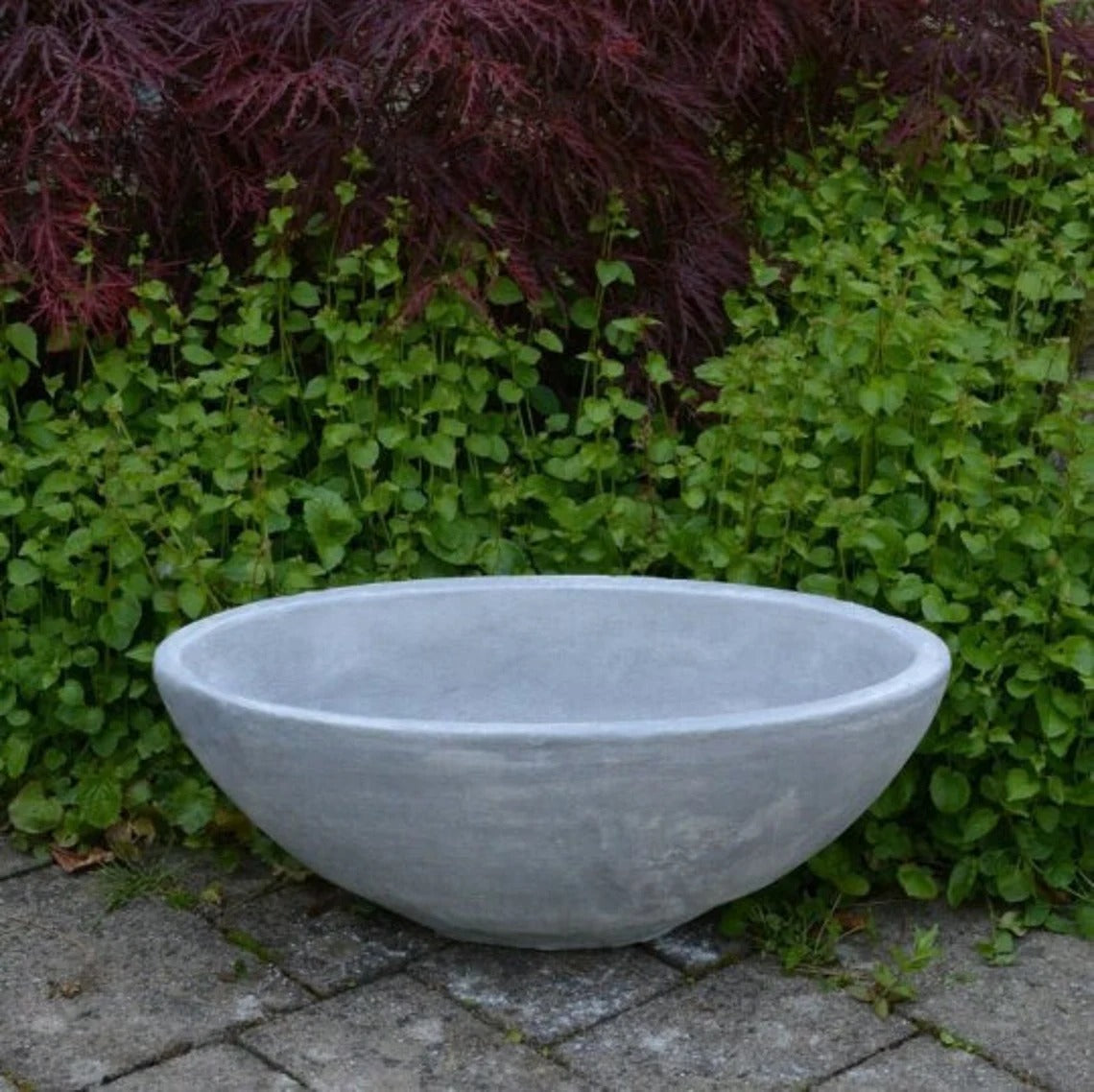 Massive bowl statue