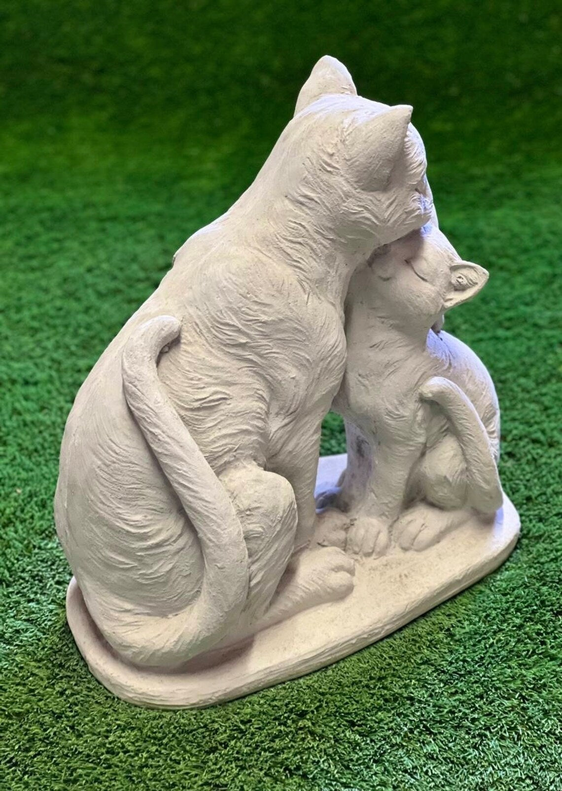 Two concrete cats statue