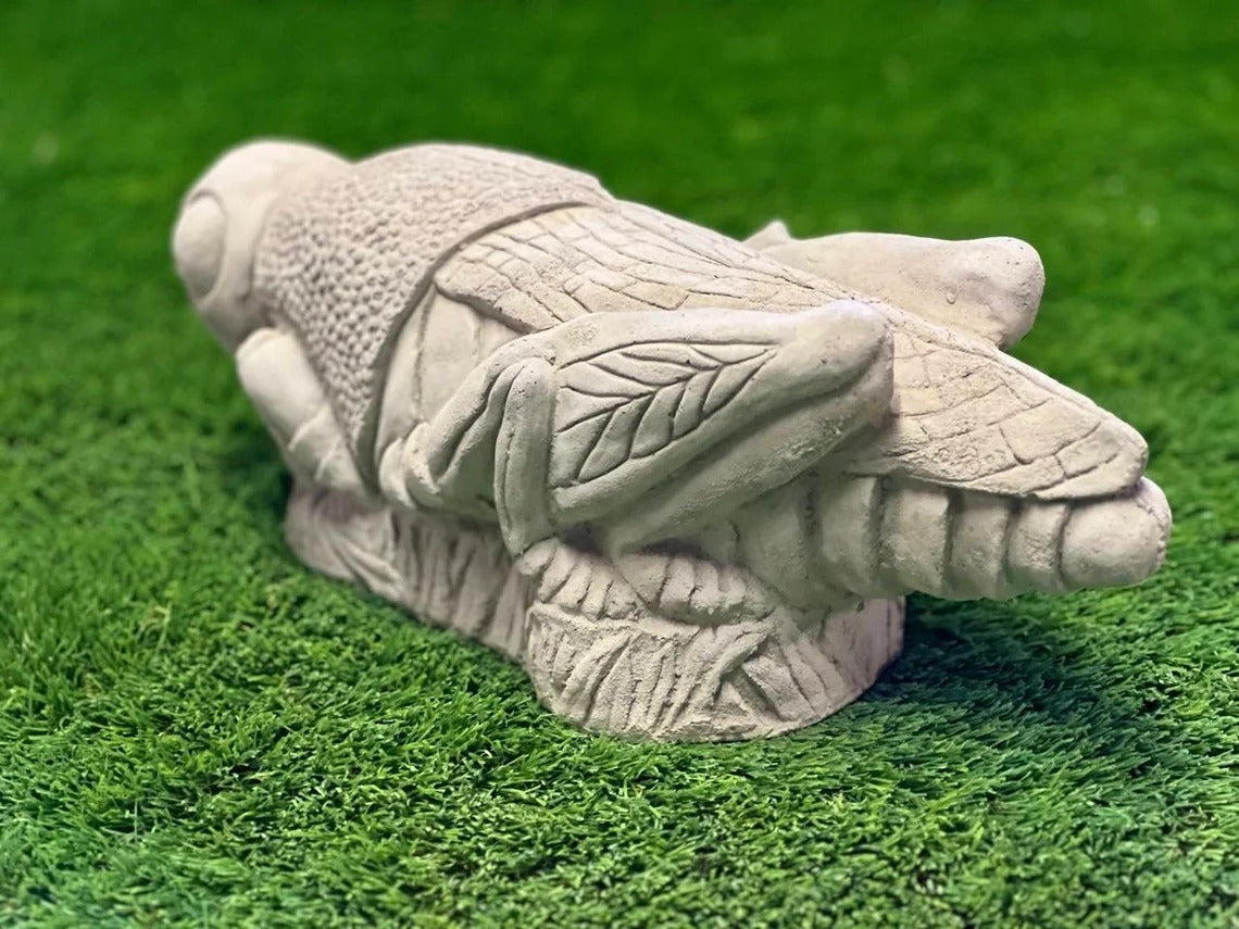 Grasshopper statue