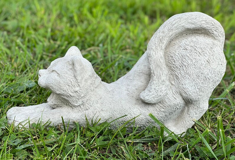 Stretching cat statue