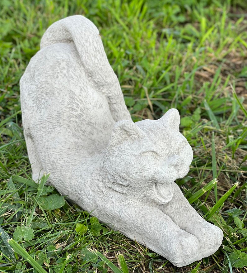 Stretching cat statue