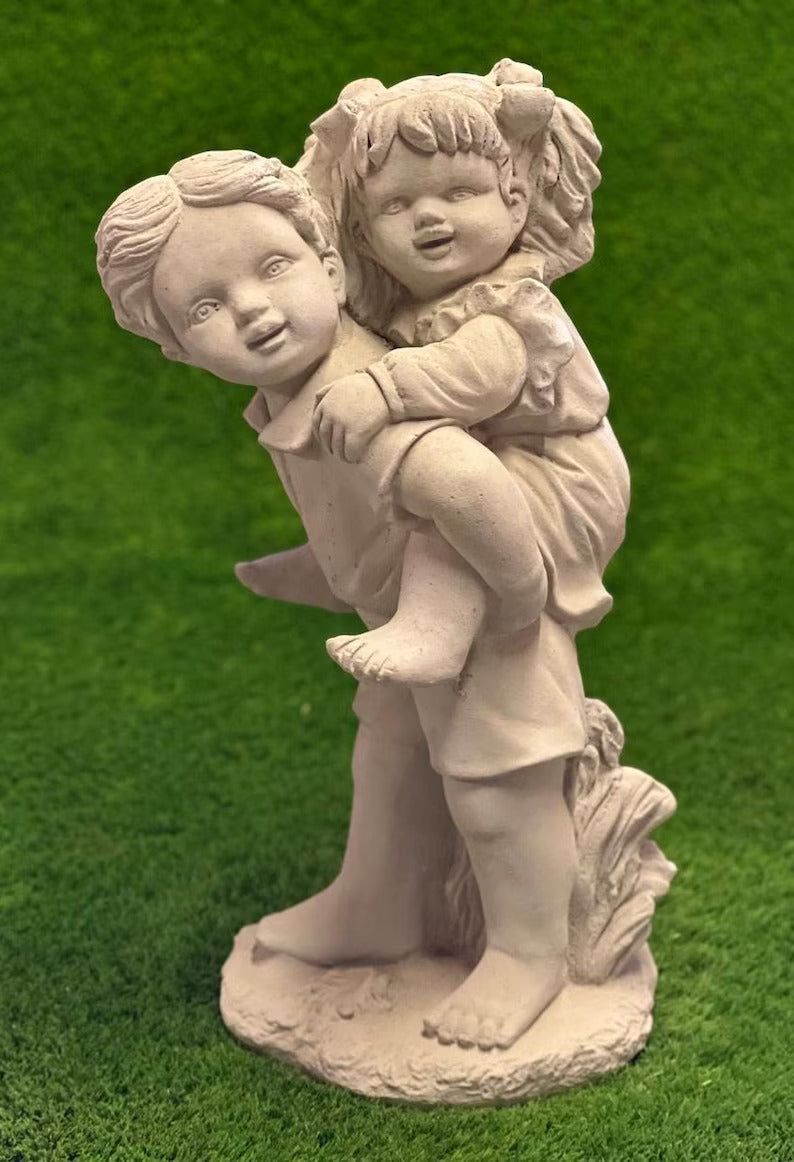 Kids piggy back statue