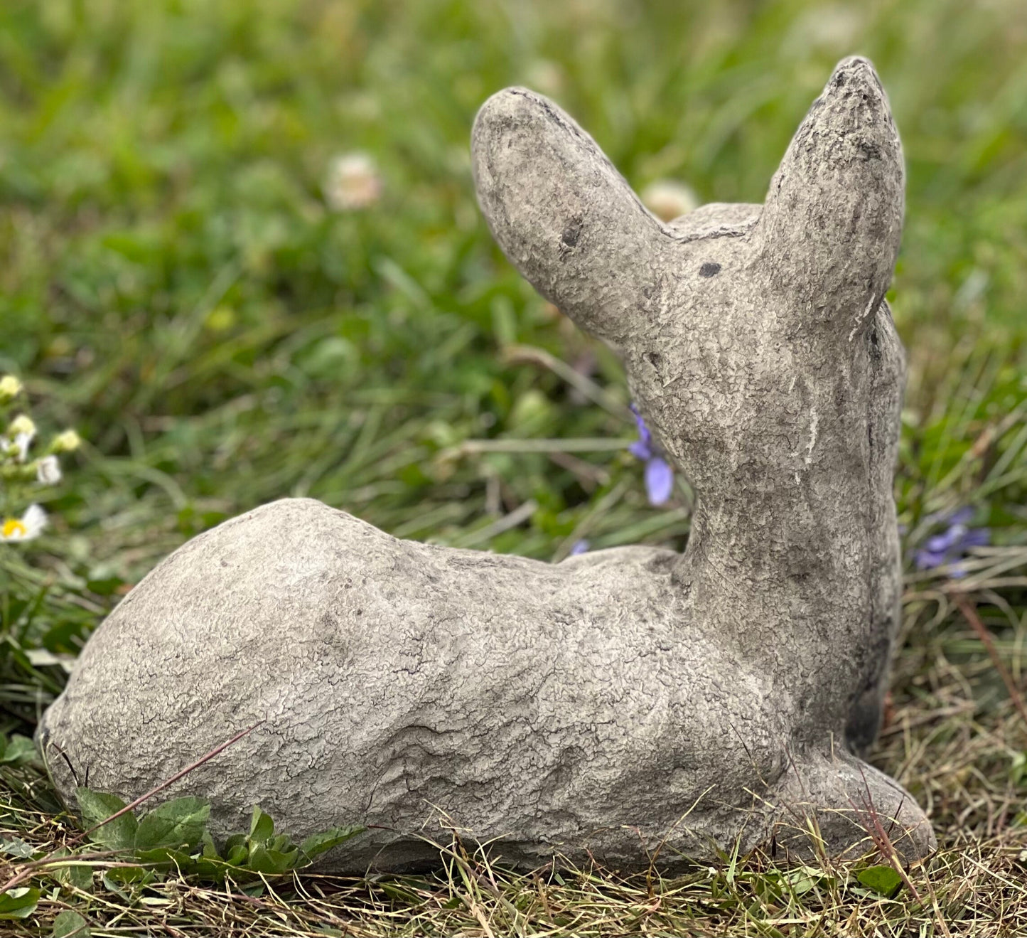Deer laying statue