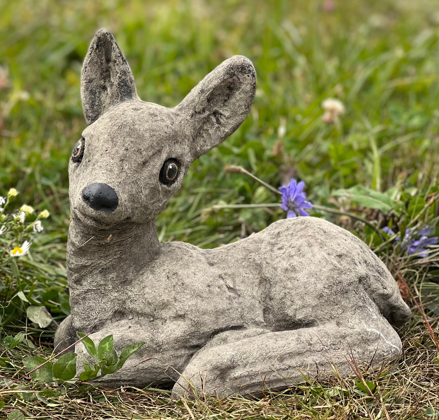 Deer laying statue